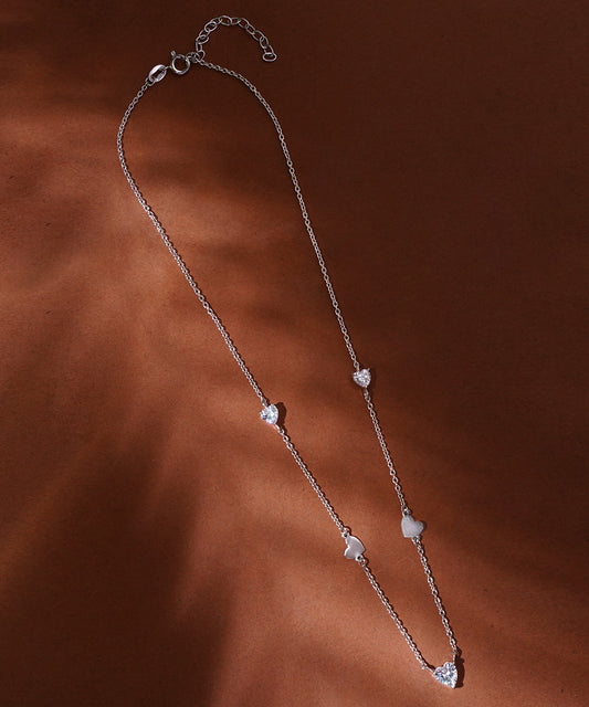 Silver Necklace with Multiple Heart Accents