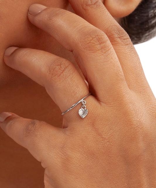 Silver Band Ring with Sunburst Textured Dangle Heart