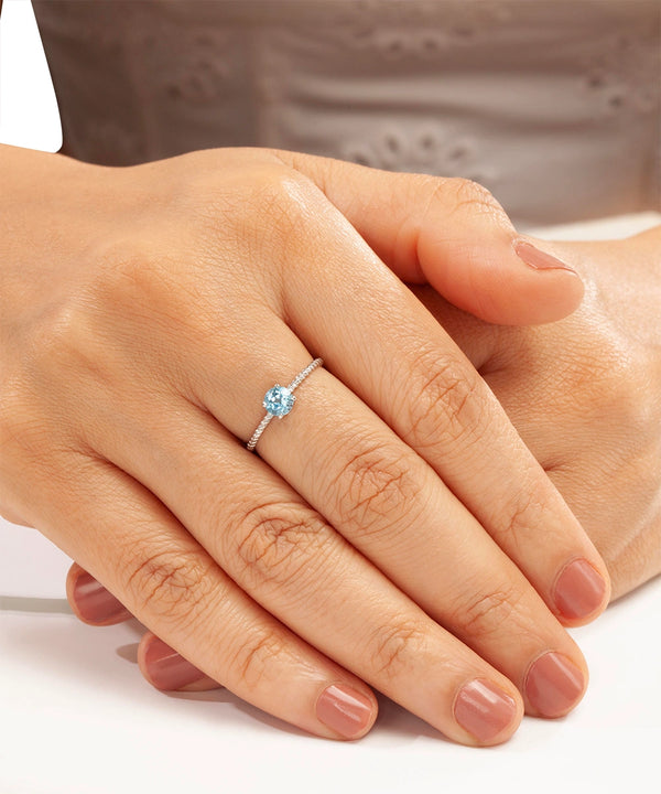 Silver Blue Topaz Solitaire Twisted Ring