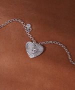 Textured Sunburst Heart and CZ Dangle Bracelet